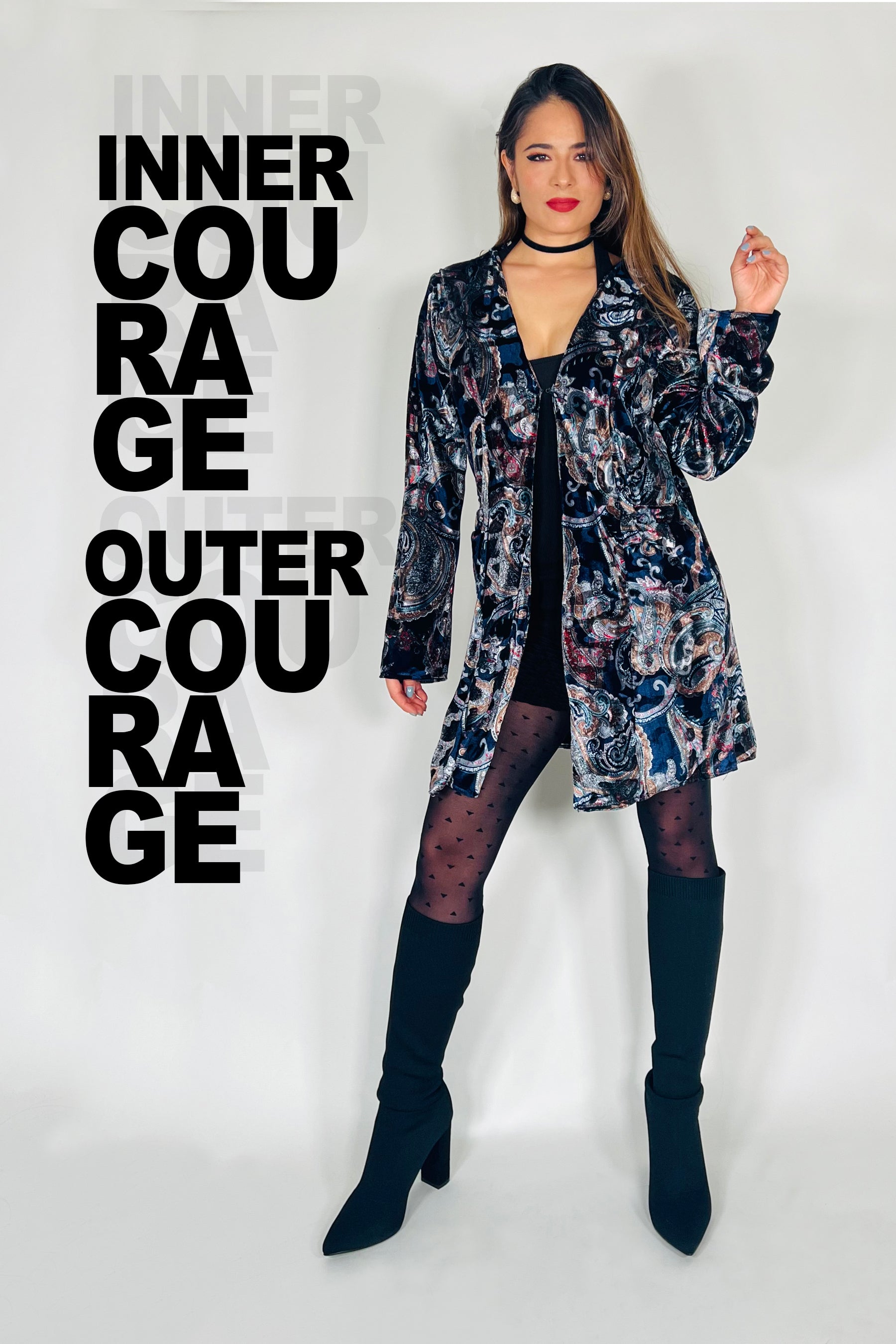 Woman wearing a floral coat with text 'INNER COURAGE OUTER COURAGE' on a white background